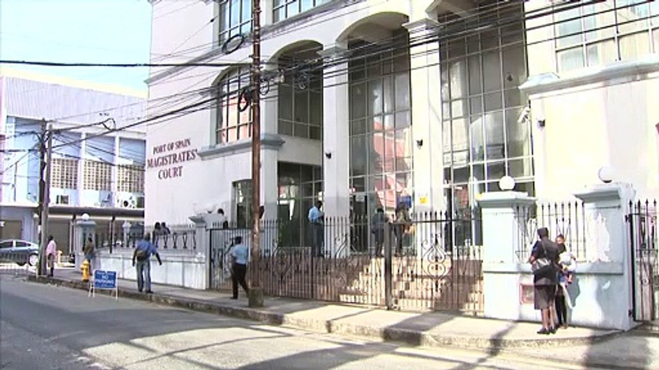 FIVE CHARGED IN $.9M FRAUD