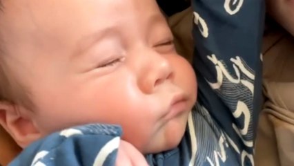 Baby boy gives fierce stare to camera after finding himself being recorded in morning