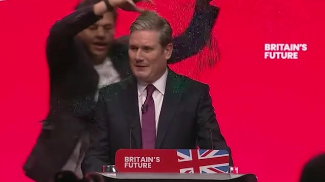 Keir Starmer covered in glitter by protester during Labour Party Conference speech