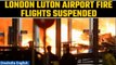 London Luton Airport fire: Flights suspended after large car park fire | Watch | Oneindia News