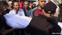 La fila di corpi davanti a un ospedale di Gaza, sale bilancio dei morti