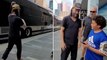 Keanu Reeves plays catch with young fan before performing with band Dogstar
