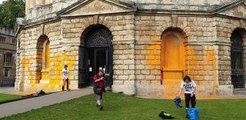 Just Stop Oil student activists paint Oxford University building orange