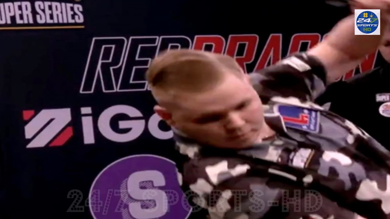 darts star incredibly caught an unfortunate bounce out in his shoe as he tried in vain to avoid the out of control arrow - only to see it land in his foot