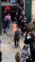 Kylie Jenner looked nothing short of sensational in a figure-hugging sparkly gold gown.