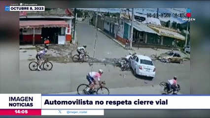 Ciclistas se impactan contra automóvil