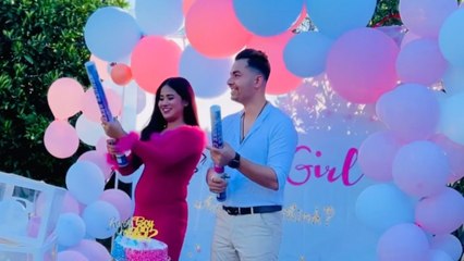 Couple finds out the gender of their upcoming baby on their gender reveal *wholesome*