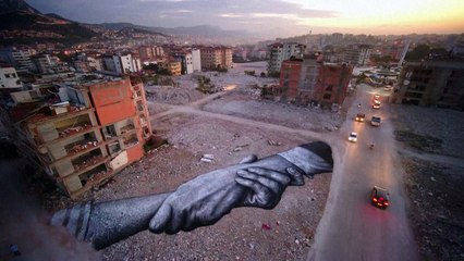 French artist Saype paints mural on Turkey earthquake rubble