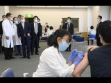 Suga inspects coronavirus vaccination program at Tokyo hospital