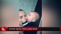 Annesine öpücük saldırısı yapan sevimli bebek