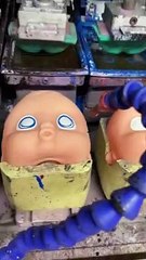 Doll Factory Stamps On Faces
