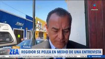 Regidor de San Pedro Cholula se pelea en medio de una entrevista