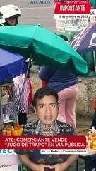 Vendedora de jugo de naranja llena botellas con trapo mojado en lugar de cítricos