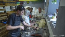 Volunteers in Ukraine's Kharkiv cook for hospital, soldiers