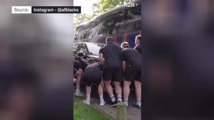 The incredible moment the All Blacks lift a car blocking their team bus