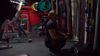 Michael Gundill, cable biceps curls with a Tryon bar