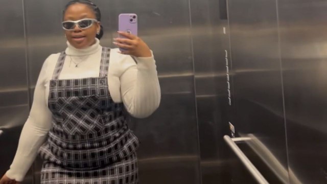 Woman's outfit flex in elevator comes to a spooky halt after lights go out