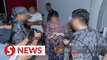 136 illegal immigrants held in raid on KL luxury condo