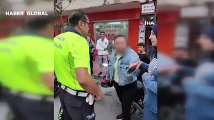 Kasksız sürücü ile polisin yaşadığı gergin diyalog kameraya yansıdı
