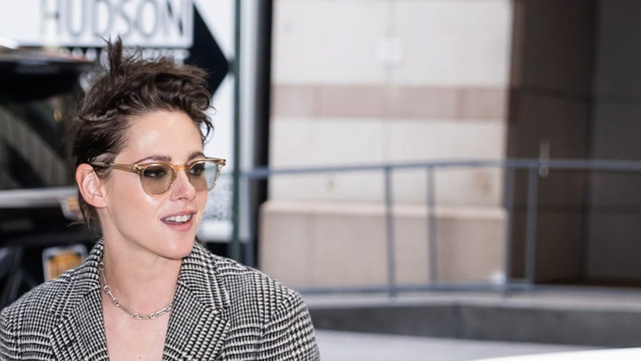 Kristen Stewart's Version of Workwear Includes a Bra-Baring Plaid Blazer and Hot Pants