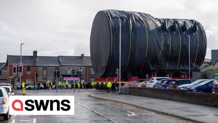 Incredible scenes show Royal Navy's new nuclear submarine moved along suburban streets