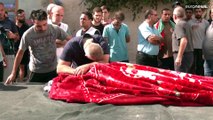 دمارٌ واسع وجثثٌ مصطفّة وحرقةٌ على فراق الأحبة.. هكذا صحت الكنيسة التي قصفتها طائرات إسرائيل في غزة
