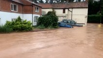 Pub and houses flooded as deep water rushes down road in Nottinghamshire village