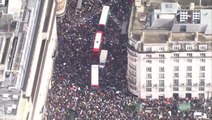 Palestine supporters march towards Downing Street as thousands gather in London