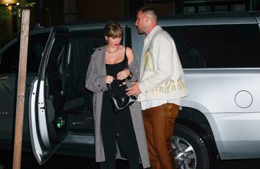 Taylor Swift and NFL star Travis Kelce 'in love'