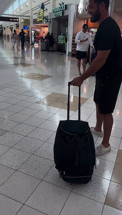 Suitcase Goes Vroom Vroom at the Airport