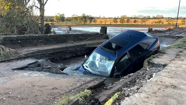 Car left stranded and sinking on collapsed bridge as Storm Babet batters Scotland