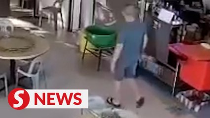 Man arrested after threatening cook with long machete