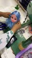 Doll Gets Blue Hair Sewn On