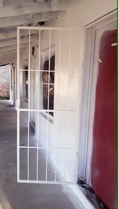 Progress of charcoal walls to white walls