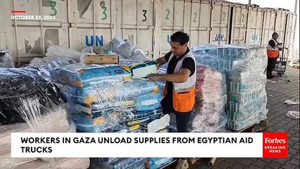 34 Aid Trucks Arrive In Gaza, Workers Unload Supplies From Egypt