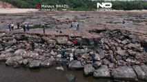 کشف حکاکی‌های سنگی عصر باستان در پی خشکسالی و افت سطح آب رودخانه در آمازون