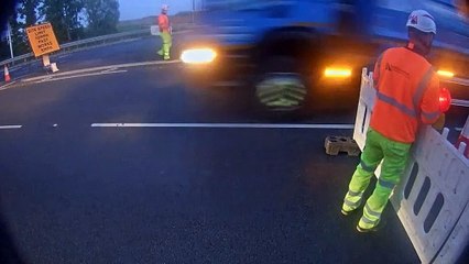 March driver banned after being caught on CCTV crashing through closed-off road as workers flee for safety on A47 near Wisbech