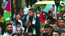 فلسطينيون في الضفة الغربية يشجبون زيارة ماكرون 