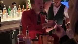 Aaron Paul and Bryan Cranston were bartending at Drake’s birthday party