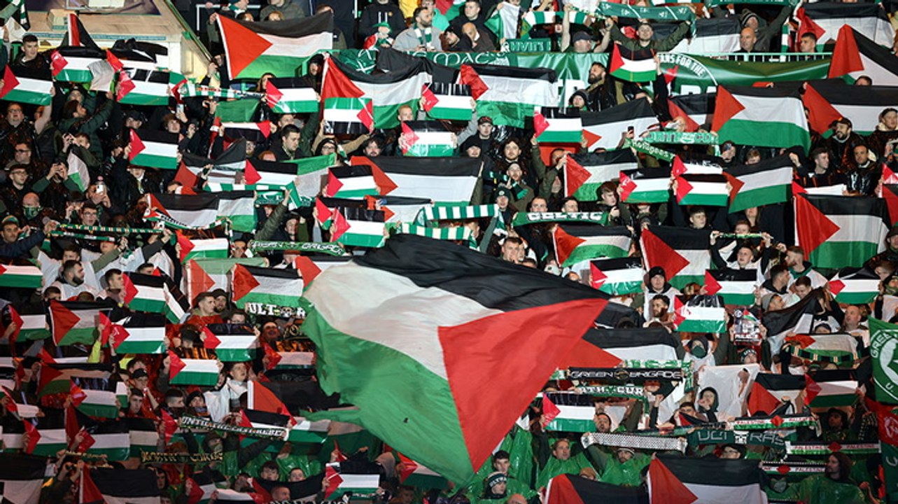 Celtic fans wave Palestinian flags ahead of Champions League fixture in defiance of club appeal