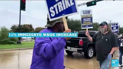 Striking US autoworkers reach preliminary deal with Ford
