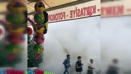 Ağır hasarlı bina yıkım esnasında kepçenin üzerine çöktü