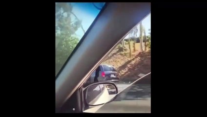 WARNING: Is that people robbing a car crash Los Angeles