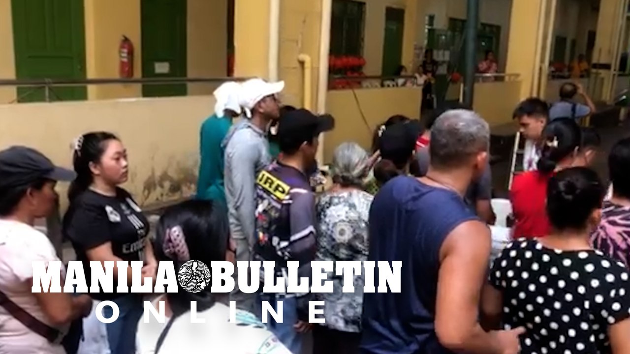 Manila voters complain about the delay in casti...