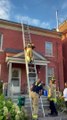 Cat Jumps Out of Firefighter's Arms While Being Rescued