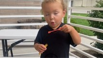 Cute little toddler tries his hand at blowing bubbles *Wholesome Toddler Video*
