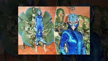 Heidi Klum dresses up as a giant peacock for her annual Halloween party