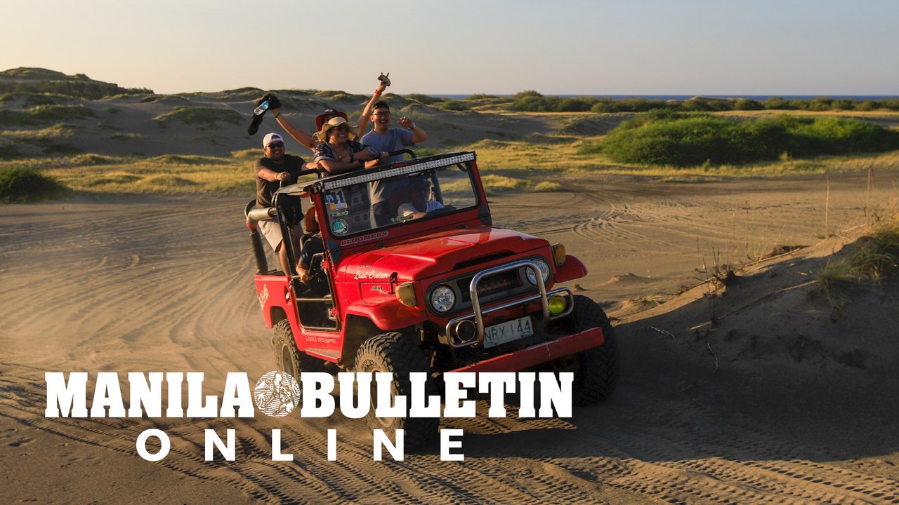 Tourists enjoy 4x4 ride jeep adventure ride at Paoay Sand Dunes in Ilocos Norte