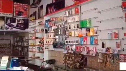अलीगढ़: मोबाइल की दुकान में दीवार काटकर की गई चोरी