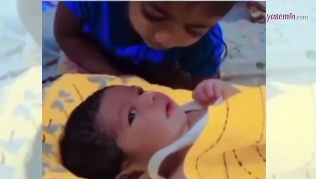 Gazze'de kardeşinin kulağına İhlas suresi okuyan küçük kızın görüntüleri duygu seli yaşattı